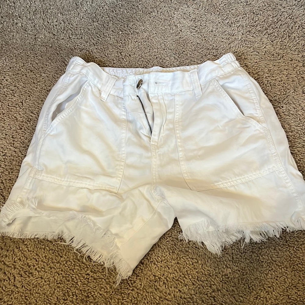 White comfy shorts from Aerie. Light with pockets. Cute button detail.